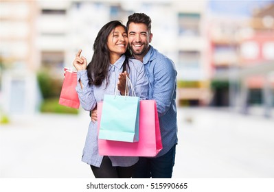 Young Couple Holding A Shopping Bags