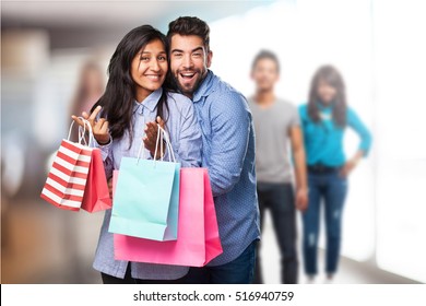 Young Couple Holding A Shopping Bags