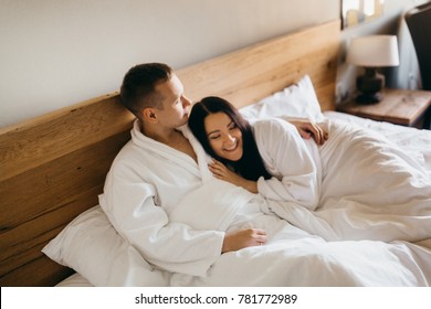 Young Couple In The Hotel At Morning 