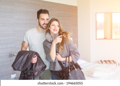 Young Couple At Hotel Room