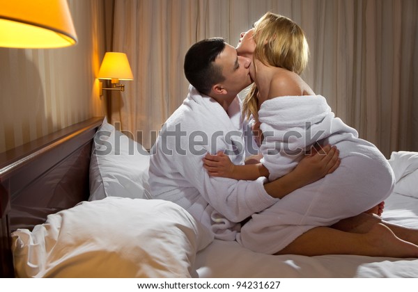 Young Couple Hugging On Bed Bedroom Stock Photo Edit Now