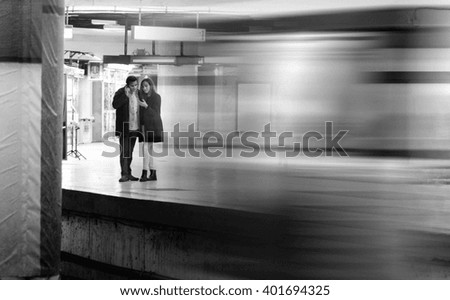 Similar – waiting for the train