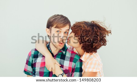 Similar – Young couple kissing in a studio portrait