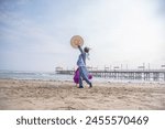 Young couple of kids marinera dancers peruvian traditional dance dancing in Huanchaco Trujillo Peru beach