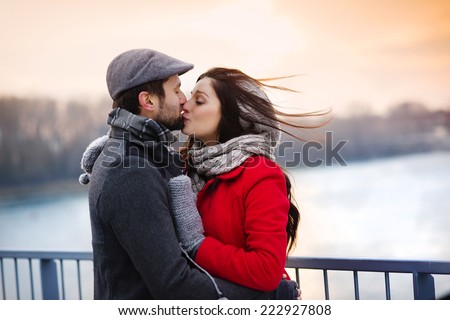 Similar – Image, Stock Photo Couple in love kissing on the terrace