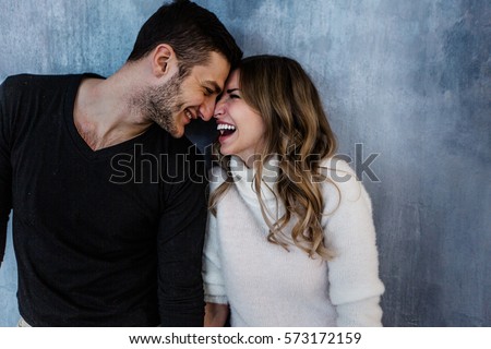 Young couple in love have fun i on new years eve or st valentines day