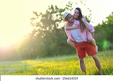 Young Couple In Love Having Fun And Enjoying The Beautiful Nature