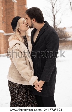 Young couple in love hug each other.Portrait of young beautiful couple kissing