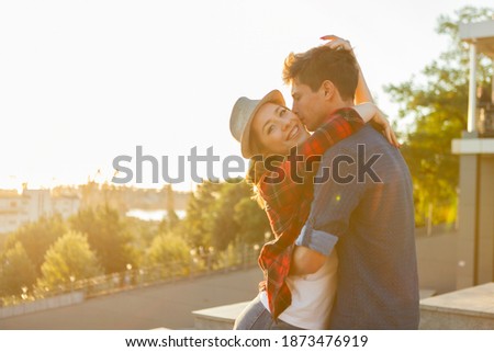 Young couple in love hugs. Spending time together. Love concept