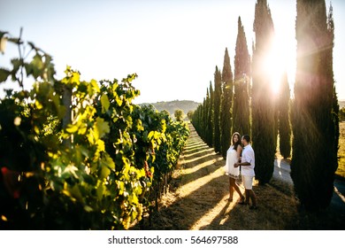 Young couple in love  outdoors in Tuscany - Powered by Shutterstock