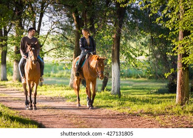 Young couple in love riding a horse - Powered by Shutterstock