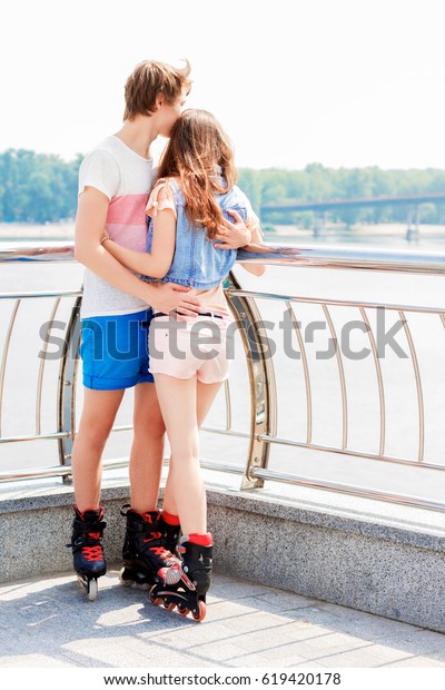 Young Couple Love Roller Skates Hugging Stock Photo 619420178 | Shutterstock