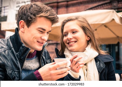 Young Couple lovely enjoying a cup of Coffee 