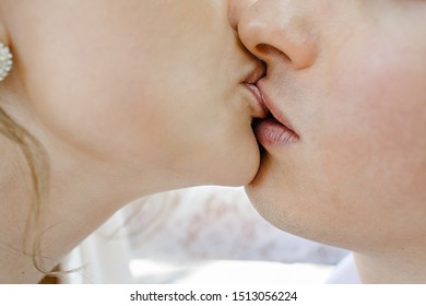 Young couple is lovingly kissing