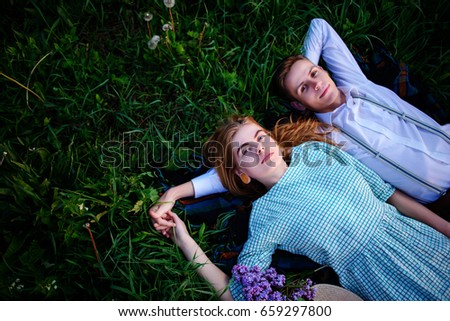 Similar – 2 young women sitting opposite each other