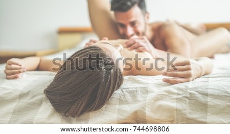Young Couple Making Passionate Foreplay Before Sex In Hotel Room Handsome Lovers Having Sexual Romantic Young Couple Making Passionate Foreplay Before Sex In Hotel Room Handsome Lovers Having Sexual Romantic