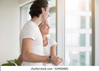 Young Couple, In A Modern Flat, Holding Key, Planning To Extend The Family, Mortgage Broker, Real Estate Agent Approved For A Large Home Loan, First Apartment For Newlywed, Honeymoon