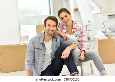 Young Couple Moving Into New Home