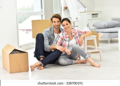 Young Couple Moving Into New Home