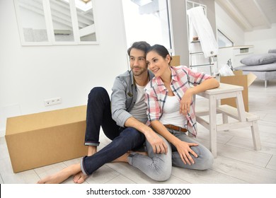 Young Couple Moving Into New Home