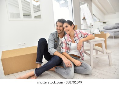 Young Couple Moving Into New Home