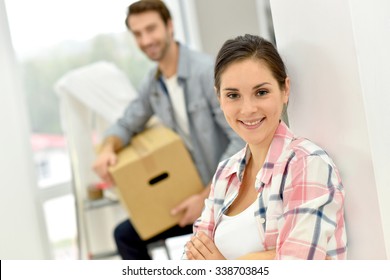 Young Couple Moving Into New Home