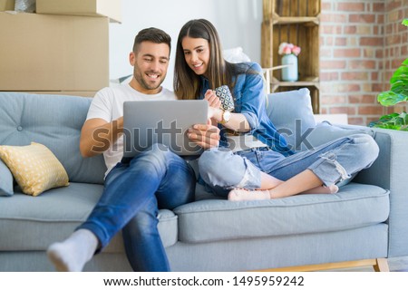 Similar – Image, Stock Photo Young man and woman relaxing in the bar and having drinks. Nightlife and hanging out