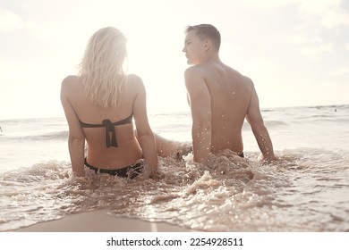 young couple on the beach, romantic person summer sea vacation - Shutterstock ID 2254928511