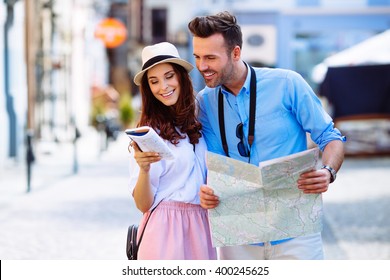 Young Couple On A Sightseeing Tour In Europe  Reading Guide