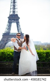 Young Couple On Their Wedding Day In Paris