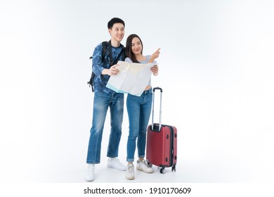 Young Couple Packing For Vacation Travel On Isolated. Young Asian Man And Women Are Preparing For The Journey Happily On White Background.