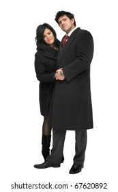 Young couple posing isolated in white
