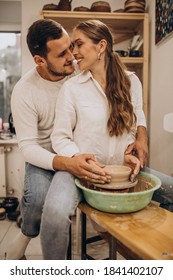 Young Couple At A Pottery Class Together