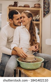 Young Couple At A Pottery Class Together