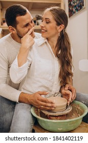 Young Couple At A Pottery Class Together