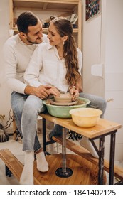 Young Couple At A Pottery Class Together