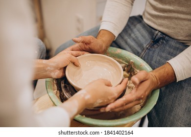 Young Couple At A Pottery Class Together