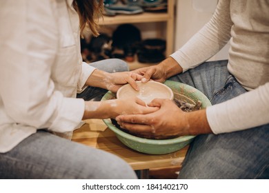 Young Couple At A Pottery Class Together