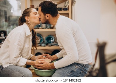 Young Couple At A Pottery Class Together