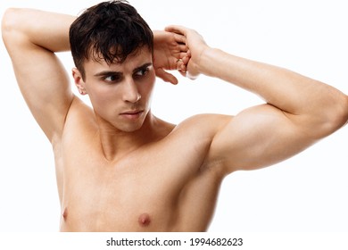 Young Couple With Pumped Up Muscles Bodybuilder Hands Behind Head 