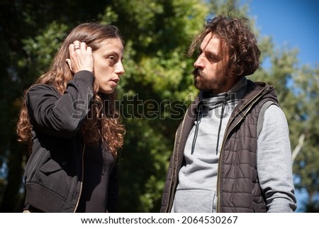 Similar – Image, Stock Photo happy twin sisters stand on a bridge and look up