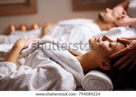 Young couple receiving head massage at beauty spa Zdjęcia stock © 
