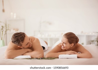 Young Couple Relaxing In Spa Salon