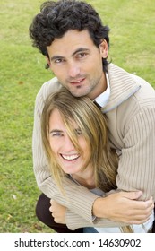 A Young Couple Reverse The Typical Gender Roles With The Girl Carrying The Boy