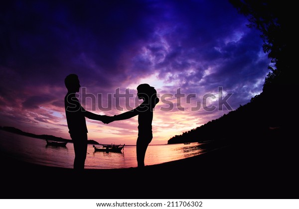 Young couple romantic Scene of love on the beach.