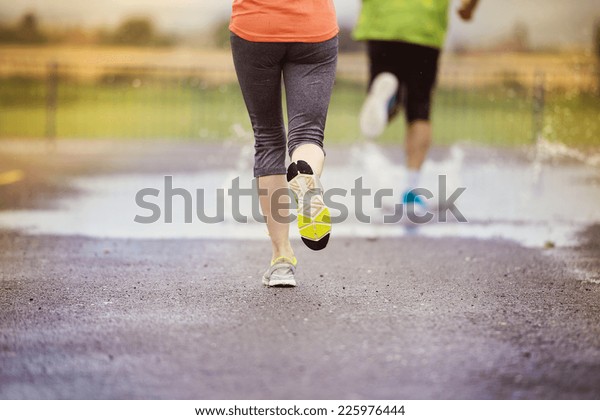 running barefoot on asphalt