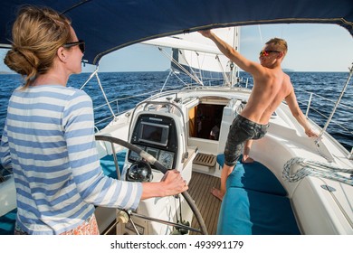 Young Couple Sailing In Andaman Sea At Sunny Day