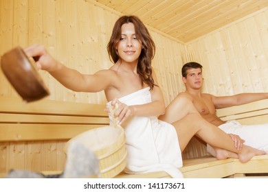 Young Couple In Sauna