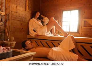 Young Couple In Sauna