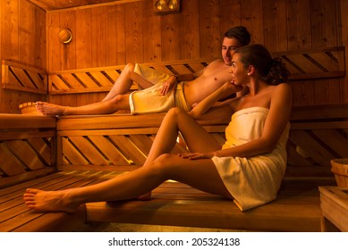 Young Couple In Sauna